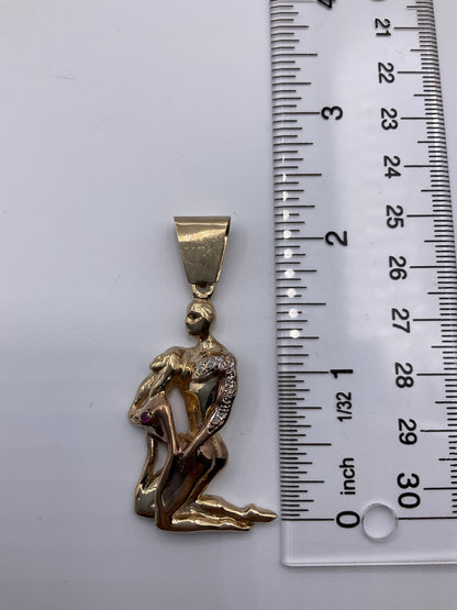 10K Yellow Gold Artistic Couple Pendant With Diamond Accents 12.8g