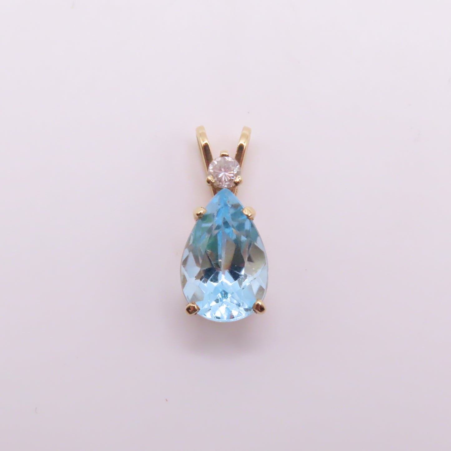14K Yellow Gold Pear Blue Topaz & Round Diamond Pendant 3/4" 2g