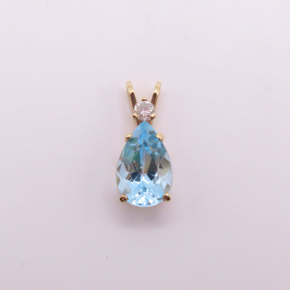 14K Yellow Gold Pear Blue Topaz & Round Diamond Pendant 3/4" 2g