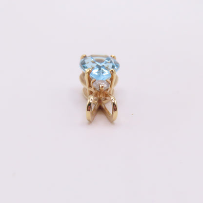 14K Yellow Gold Pear Blue Topaz & Round Diamond Pendant 3/4" 2g